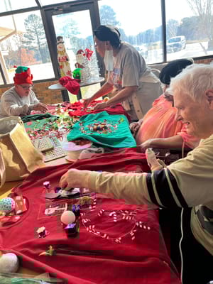 Residents participating in a festive craft activity