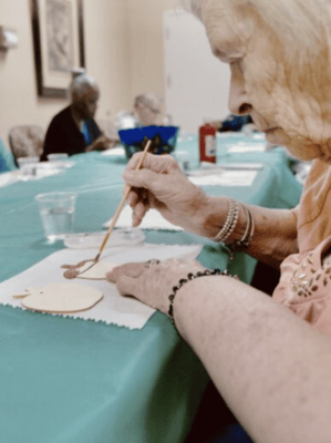 Resident engaged in an arts and crafts activity