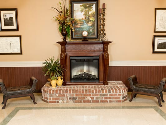 Interior lobby with fireplace and seating area