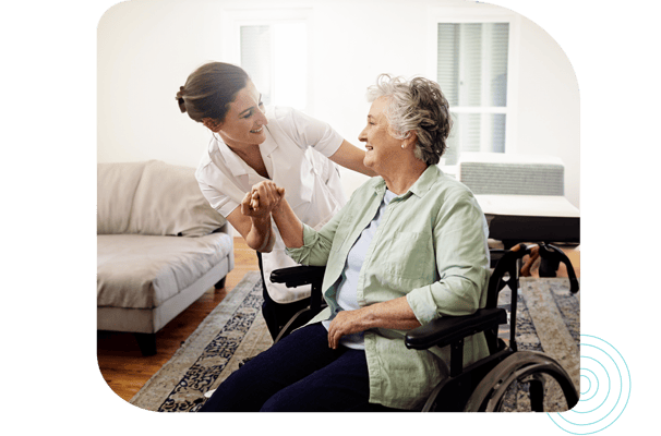 Caregiver assisting a resident in a bright room