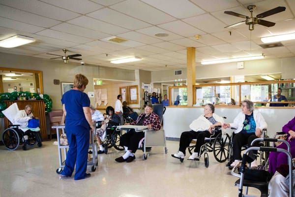 Residents interacting in a common area of the facility