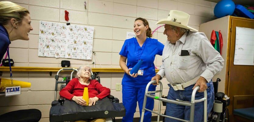 Residents participating in an activity with staff
