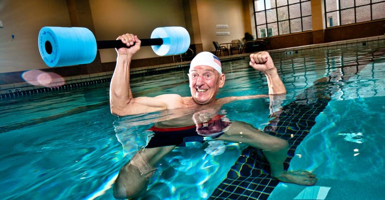 Senior man exercising in a swimming pool