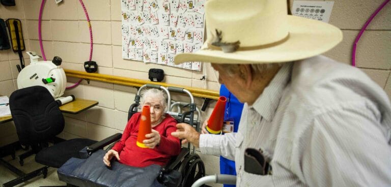 Residents engaging in a playful activity indoors