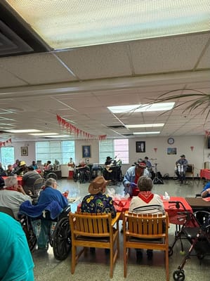 Residents enjoying live music in a common area