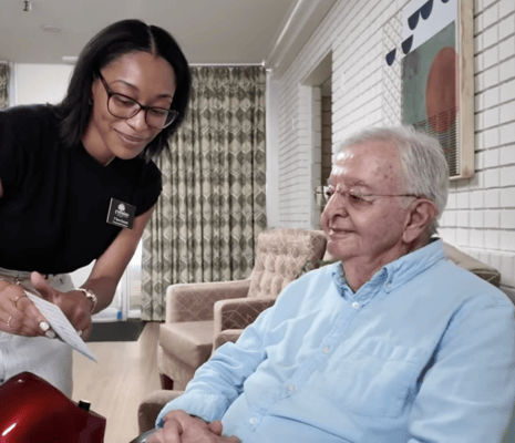 Staff member engaging with a resident