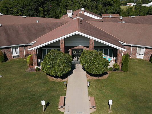 Aerial view of the assisted living facility entrance and landscaping
