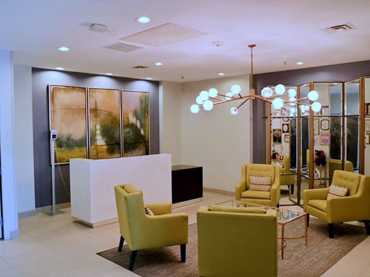 Bright interior of a facility lobby with seating