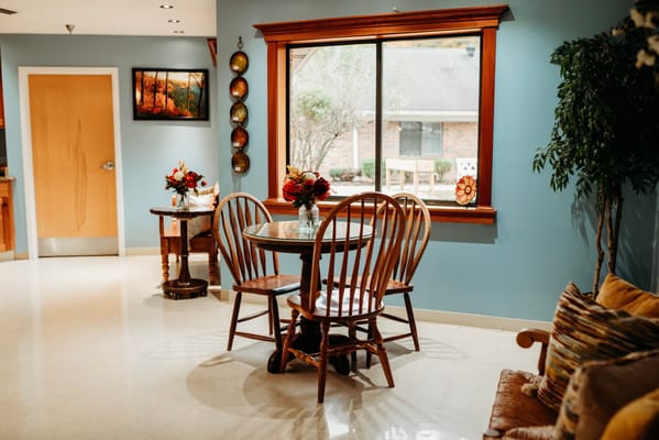 Interior common area with tables and chairs