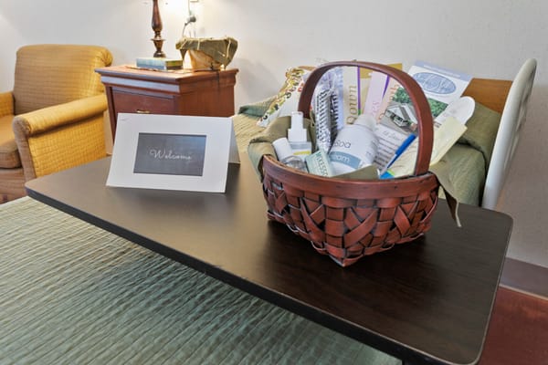Welcome basket on a table in a resident's room
