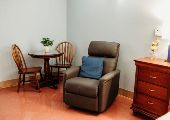Cozy corner of a living space with a chair and table