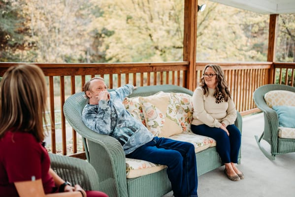 Residents enjoying time together on a porch