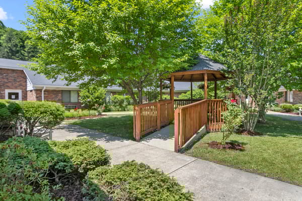Pathway leading to a gazebo surrounded by greenery