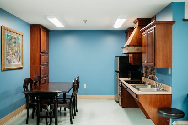 Well-equipped kitchen area with a dining table