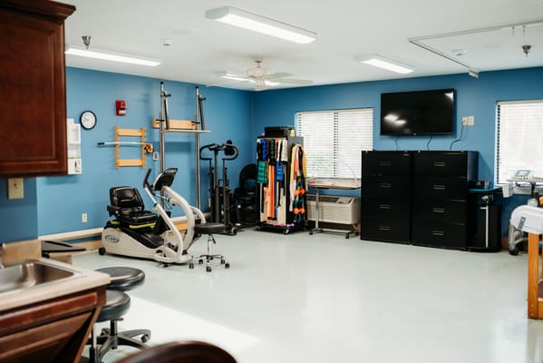 Interior view of a therapy room with equipment
