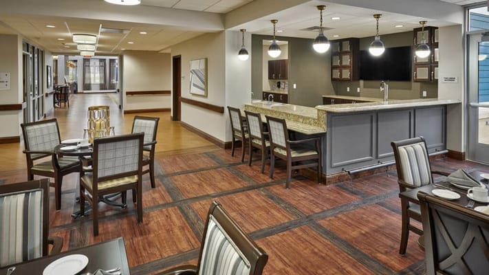 Bright dining area with modern decor and seating