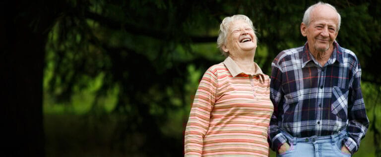 Happy elderly couple enjoying time outdoors