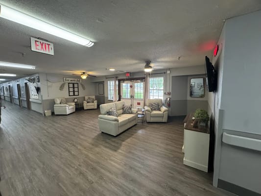 Bright common area with couches and natural light