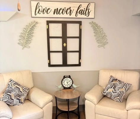 Cozy seating area with decor and clock