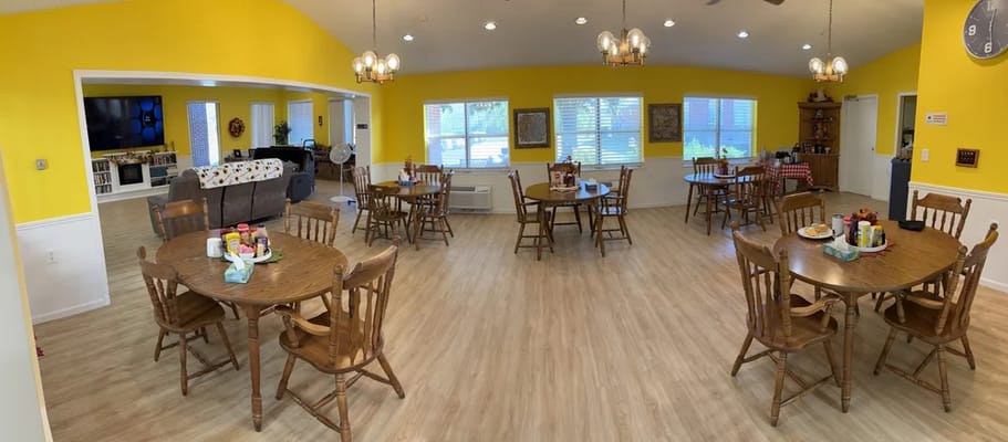 Bright dining area with tables set for meals