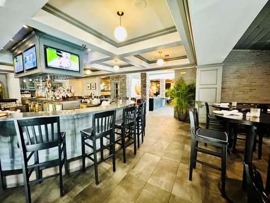 Interior view of a dining area with a bar