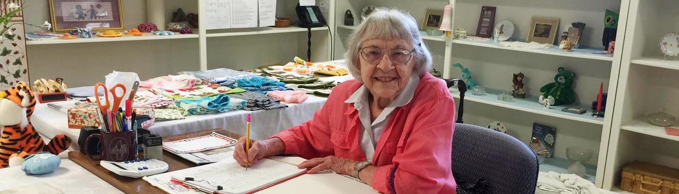 Resident engaging in an activity at a table