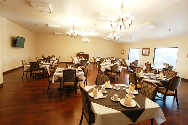 Dining room set up with elegant table settings