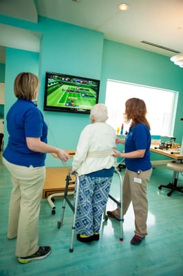 Residents participating in a virtual game activity