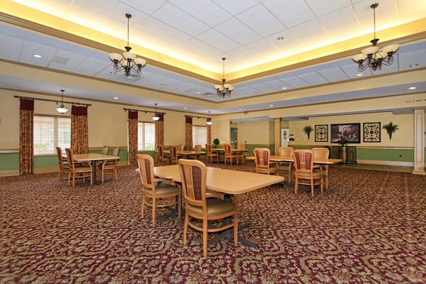 Bright interior dining area with tables and chairs