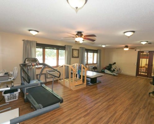 Interior view of an exercise room with equipment