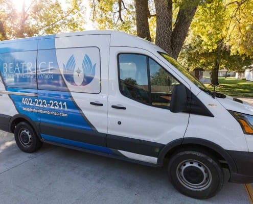 Facility transport van parked outside