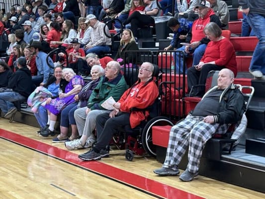 Residents enjoying an event in a gymnasium
