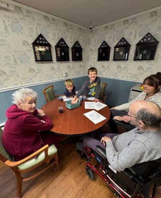 Residents and children engaging in a group activity