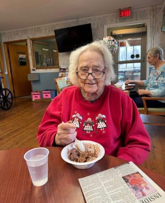 Resident enjoying ice cream in a common area