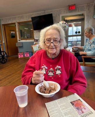 Resident enjoying ice cream in a common area
