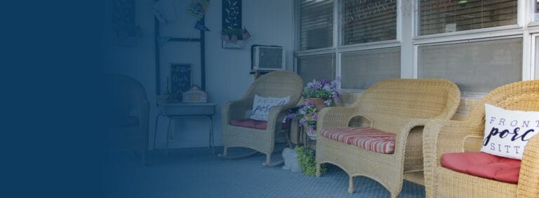 Cozy common area with wicker chairs and decor