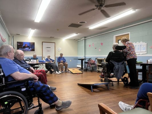 Residents participating in an indoor activity session