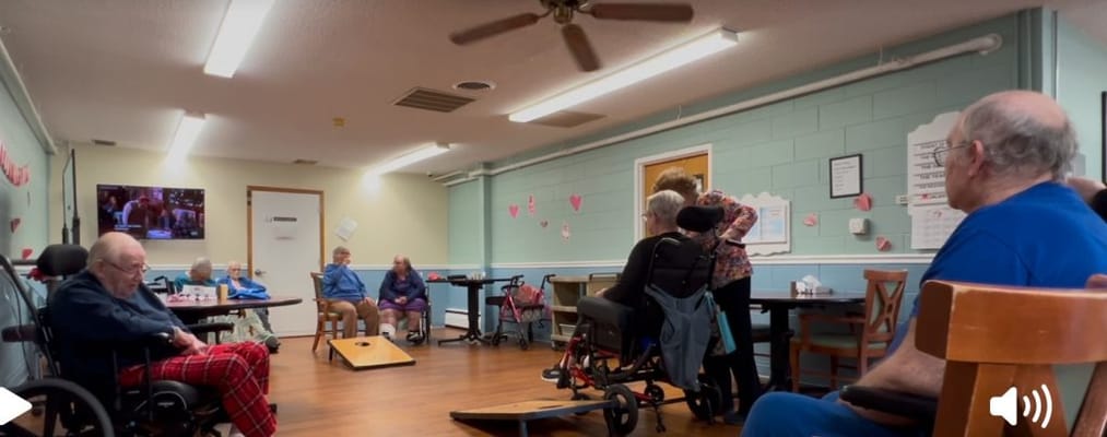 Residents participating in an indoor activity session