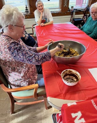 Residents making treats together in the activity room