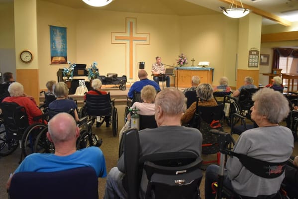 Residents enjoying a live performance in a communal space