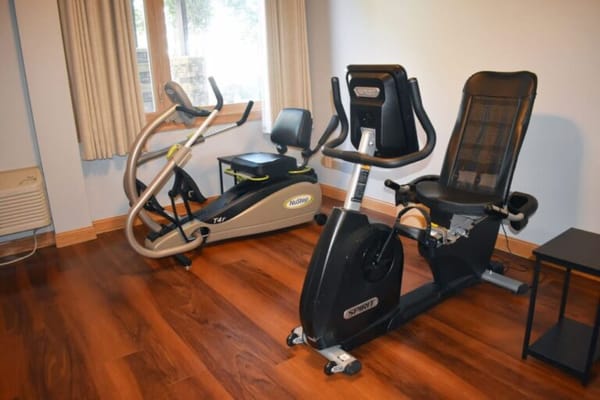 Fitness equipment in a well-lit interior room