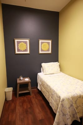 Cozy private resident room with bed and decor