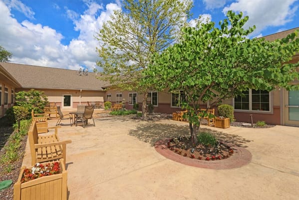 Outdoor courtyard with seating and landscaping
