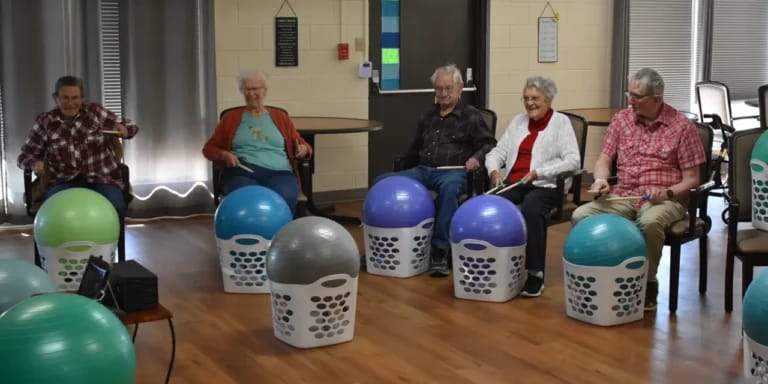 Residents participating in an engaging activity session