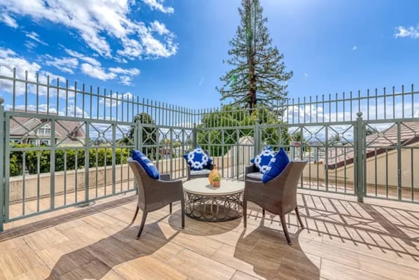 Outdoor seating area with chairs and a table