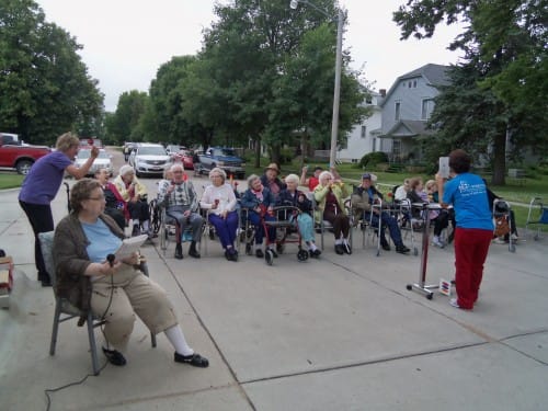 Residents enjoying an outdoor activity in a community setting