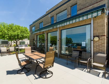 Outdoor seating area in front of the facility