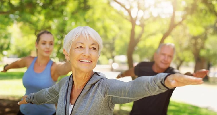 Seniors participating in an outdoor exercise class