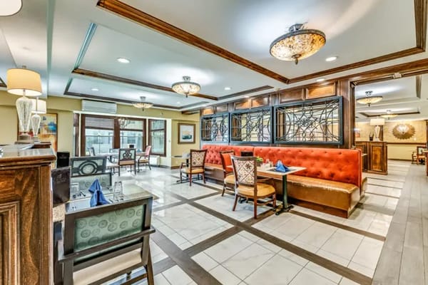 Elegant dining room with seating and decor