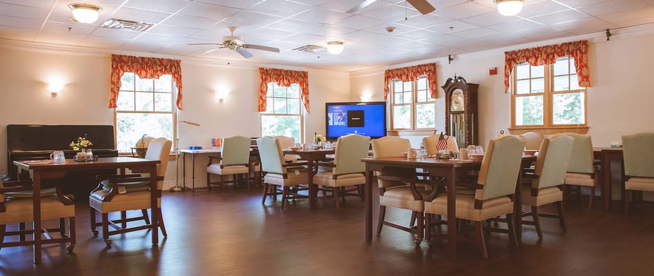 Bright dining room with tables and chairs